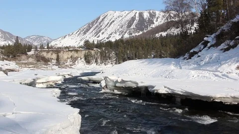 Water flowing in the river in spring, Ursul River, Altai, Russia Stock Footage 75718443