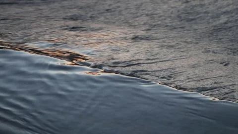 Water flowing in the river at sunset Stock Footage 73659770