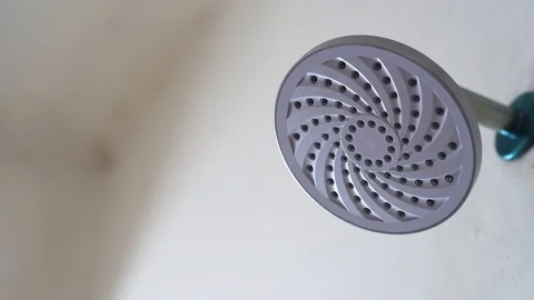 Water flowing from shower head Stock Footage 107050332