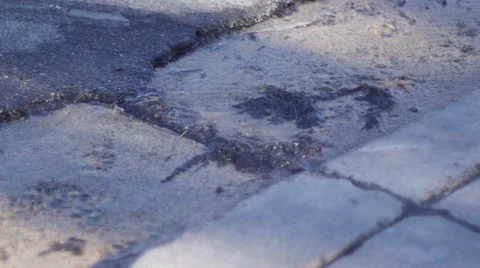 Water flowing in a storm gutter Stock Footage 47754653