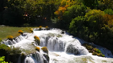 Water flowing in the stream on cascade waterfall Stock Footage 32965356