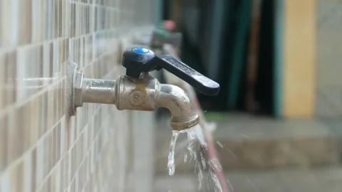 Water flowing from the tap in the ablution area Stock Footage 312904461