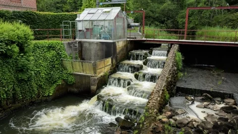 Water flowing through hydroelectric power plant and fish ladder Stock-Footage 337733641