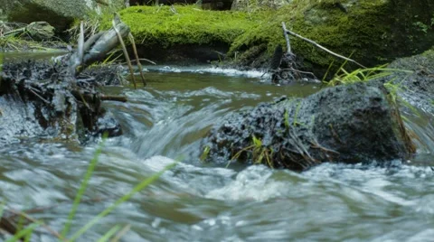 Water Flowing Through Rocks 動画素材 63213461