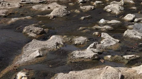 Water flowing through rocks. Stock Footage 66809364