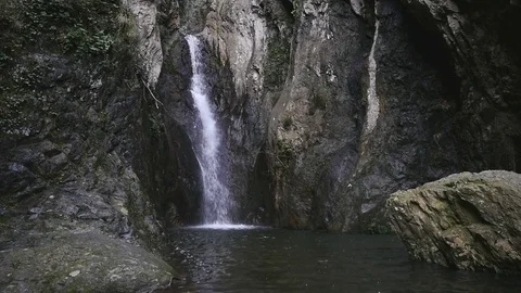 Water flowing through rocks Stock Footage 73927993