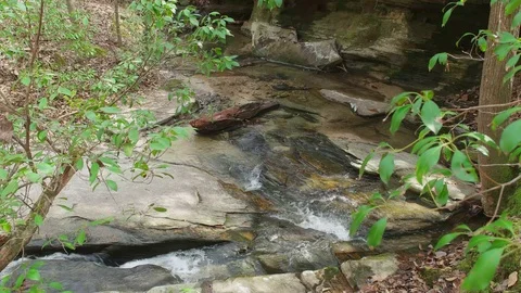 Water flowing through the rocks Stock Footage 126114980