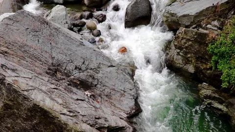Water flowing through rocks in the river. Stock Footage 111859442