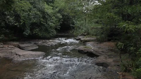 Water Flowing through rocks at Stone Creek Park in Flower Mound Texas. Stock Footage 66790531