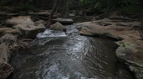 Water Flowing through rocks at Stone Creek Park in Flower Mound Texas. 動画素材 66790611