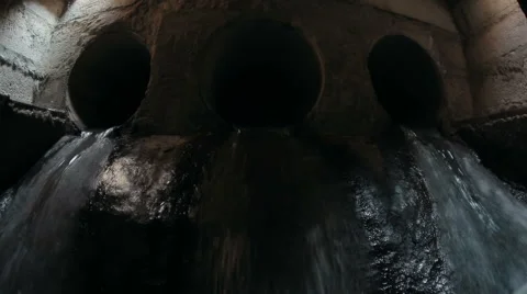 Water flowing through the sewerage Stock Footage 67987012