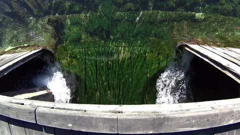 Water flowing through sluice on river Black Drin, Struga, Macedonia Stock Footage 82296662