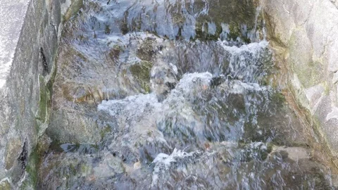 Water flowing through stone Stock Footage 122131419