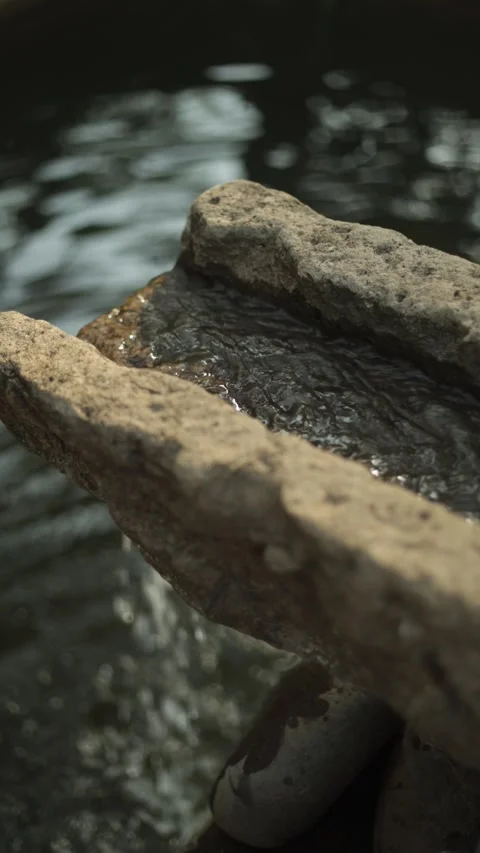 Water flowing through the stone Stock Footage 308995777