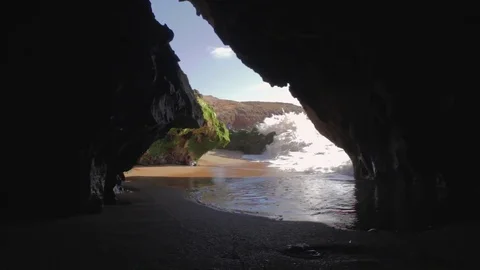 Water Flowing Under Camera in Small Grotto of Oualidia, Morocco Video stock 76846642