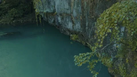 Water Flowing Under a Cave Stock Footage 138715946