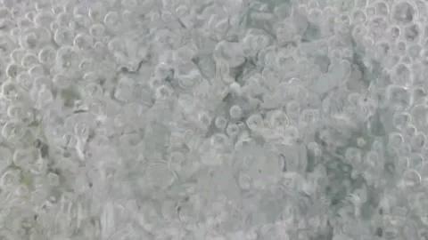 Water flowing into the water background Stock Footage 320188130