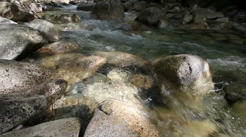 Water Flowing from Waterfall Rushing down the Creek with Rocks and Boulders Stock Footage 50001523