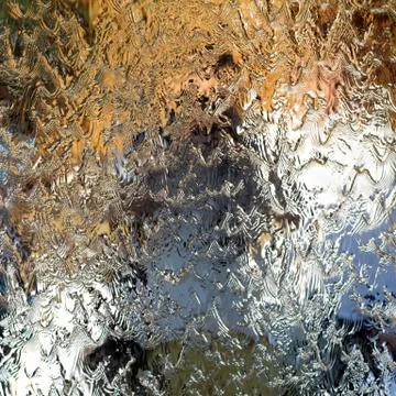 Water flows along the wall of the mirror, horizontal abstract texture, shiny  Stock Photos
