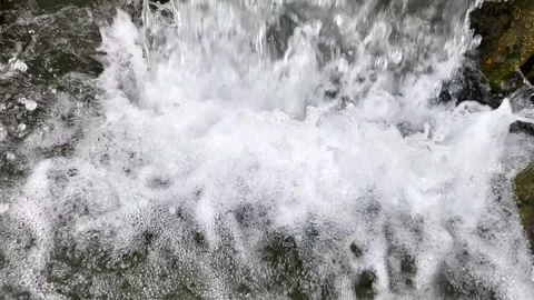 Water flows and splashes Stock Footage 284945858