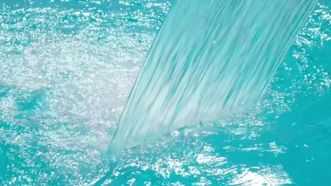 Water flows in an artificial waterfall 스톡 동영상 294987329