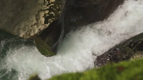 Water flows between big white stones in national park White Rocks Canyon Stock Footage 220262334