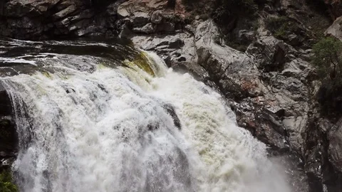 Water flows between rocks in summer Stock Footage 120526317