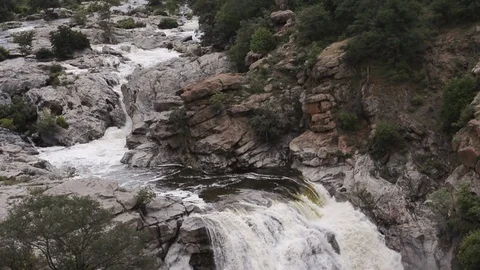 Water flows between rocks in summer Stock Footage 120526536