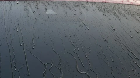 Water flows on the car while the worker is washing the car. Stock Footage 188430114