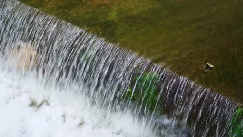 Water flows down from a concrete sewer drain. Sewage in the city. Sewage water Stock Footage 222619143
