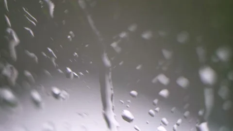 Water flows down the glass 4K Stock Footage 205569114