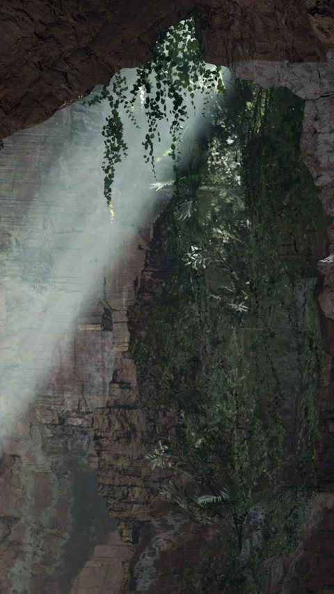 Water flows down a rock face in a cave illuminated by sunlight Stock Footage 340879467