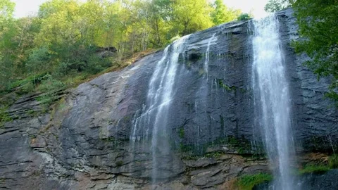 Water flows down the rocks. Stock Footage 315599899