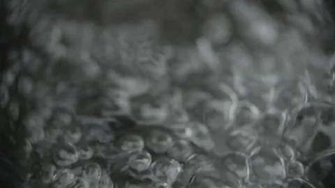 Water flows down rocks in stream, macro shot. Stock Footage 82329012