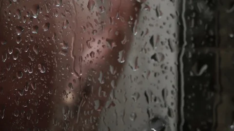 Water flows down shower stall Stock Footage 129489208