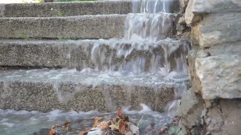 Water flows down the stairs. Flood after rain Stock Footage 211821259