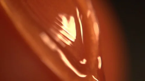 Water flows down a tomato Stock Footage 93961383