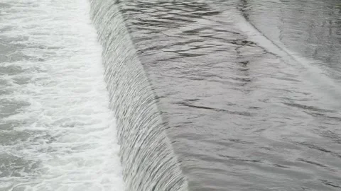 Water flows down waterfall on artificial hydraulic structure Stock Footage 301420911