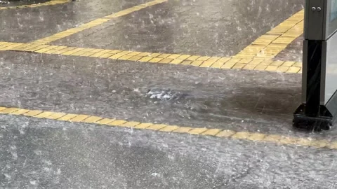 Water flows into the drain hole during heavy rain Stock Footage 244517654