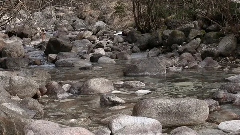 Water flows fast on the river Stock Footage 87564383