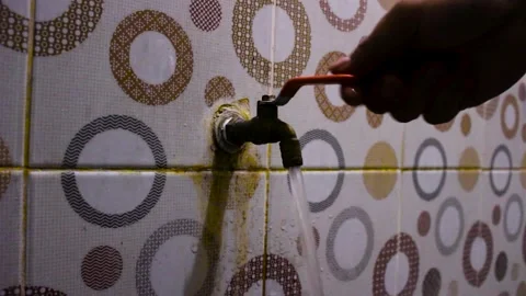 Water flows from the faucet Stock Footage 244704756