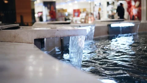 Water flows into the fountain. Close up. The work of the fountain close up. Stock Footage 122774868