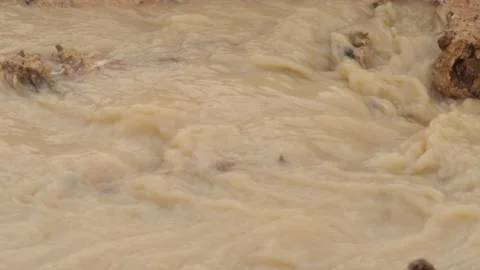 Water flows from heavy rain.	 Stock Footage 139577499
