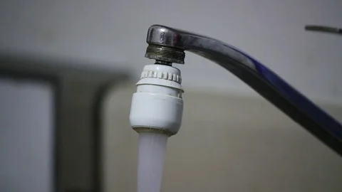 Water Flows From a Kitchen Faucet Stock Footage 81258143