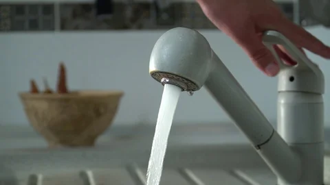 Water flows from a kitchen faucet Stock Footage 118806769