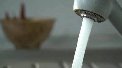 Water flows from a kitchen faucet Stock Footage 118806831