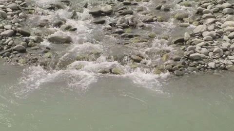 Water flows in mountain stream among stones 스톡 동영상 301421053