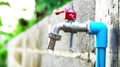 Water flows out of the tap. Video stock 158532690