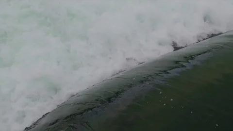 Water flows over a barrage before the Niagara Falls. Stock Footage 75802148