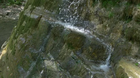 Water Flows over the Limestone Rocks Stock Footage 105263208